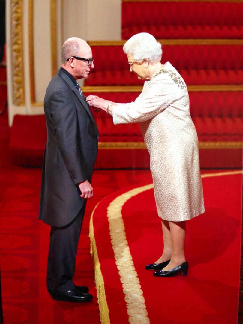 Bernie invested by Her Majesty The Queen for Services to Charity